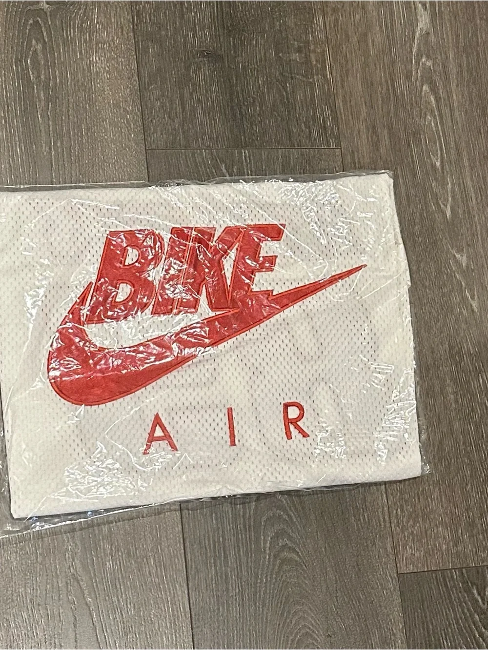 Nike Bike Air Jordan Black Tag with Red Jumpman Logo.